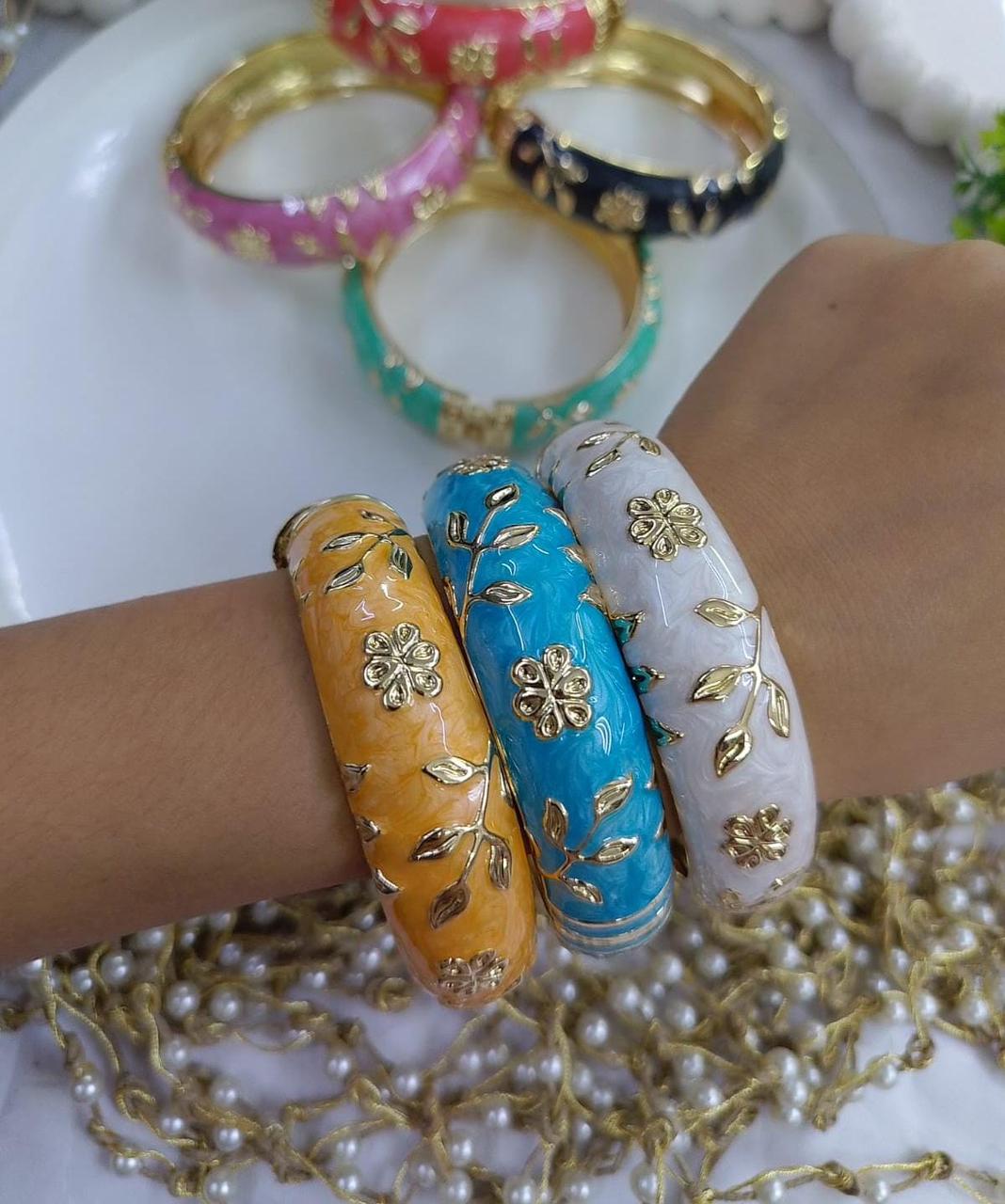 Golden work bangles