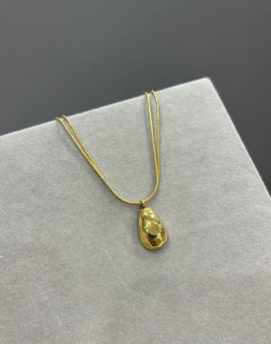 Textured pendant with double chain